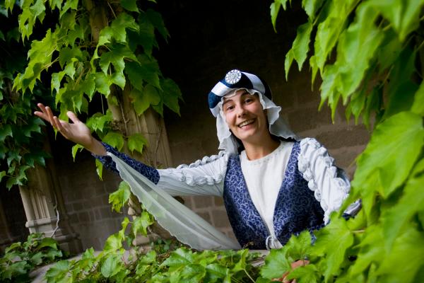 Girl in medieval attire at the Royal Palace of Olite